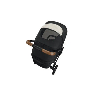 NUNA Carrinho de Passeio Tavo Next Caviar, com design elegante e recursos para proporcionar conforto ao bebê em passeios. Twisted Media