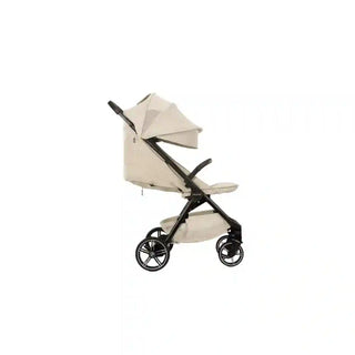 Carrinho de bebê Nuna TRVL LX BMW Crystal dobrado, compacto e elegante, ideal para uso urbano em Luanda - Twisted Media