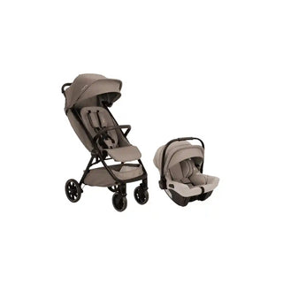 Carrinho Nuna TRVL LX + Pipa Urbn Cedar em uso com bebê - Twisted Media