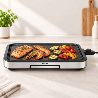 Plancha Eléctrica Antiaderente Tefal Inox 2000W - Twisted Media