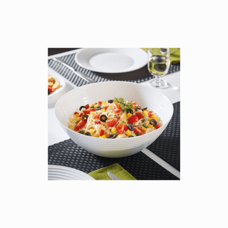 Saladeira Harena com frutas cortadas, em ambiente de cozinha.