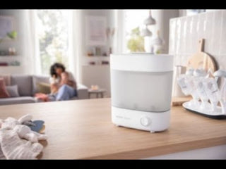 Avent Esterilizador Elétrico 3 em 1 com peças ajustáveis para diferentes tamanhos de acessórios.